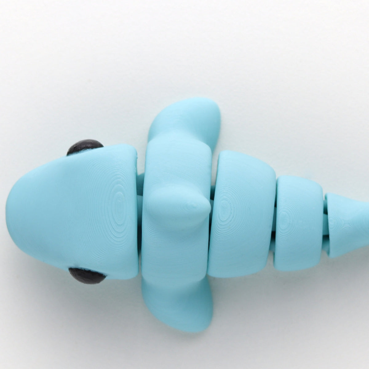 Baby Shark — articulated 3D printed shark figurine in light blue
