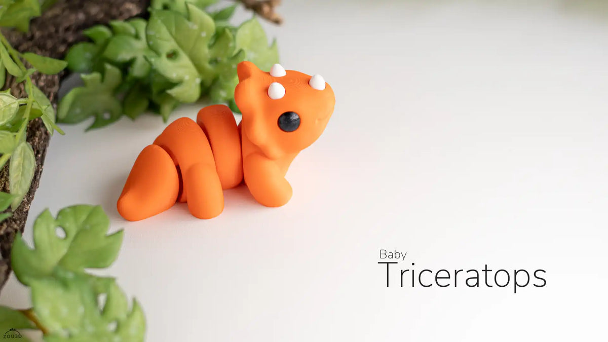 Full view of the orange Baby Triceratops design, creator photograph